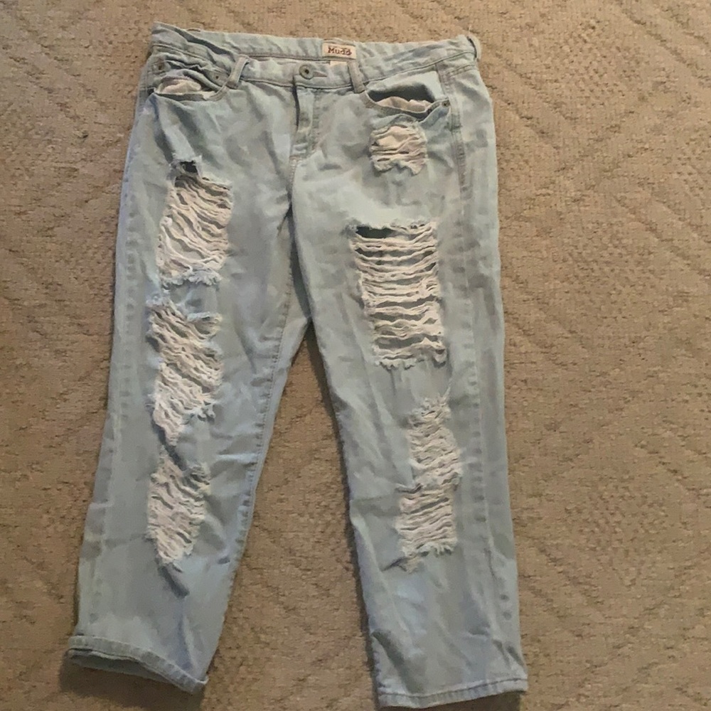 very ripped jeans